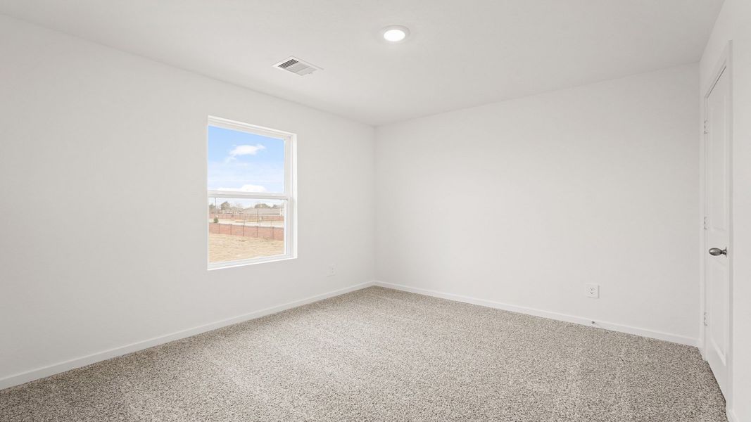 Spacious, unfurnished interior of a new home in Sunterra, Katy (Image 17).