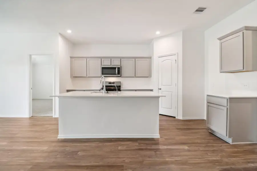 Furnished interior view inside a new home in Grand Pines, Magnolia (Image 3).