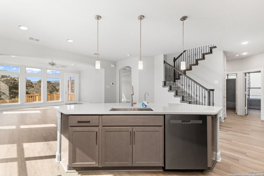 Furnished interior view inside a new home in The Enclave at Potranco Oaks, Castroville (Image 9).