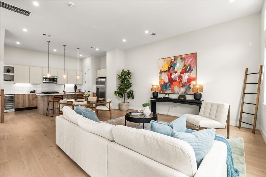 The main living level brings kitchen, dining, and lounge spaces together across one continuous floor, creating an easy layout for everyday routines.