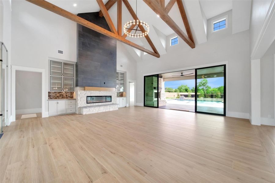 Transition between indoor and outdoor living space with ease thru the large sliding glass doors.