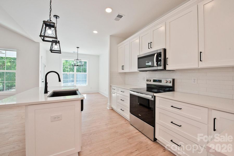 Furnished interior view inside a new home in , Concord (Image 8).