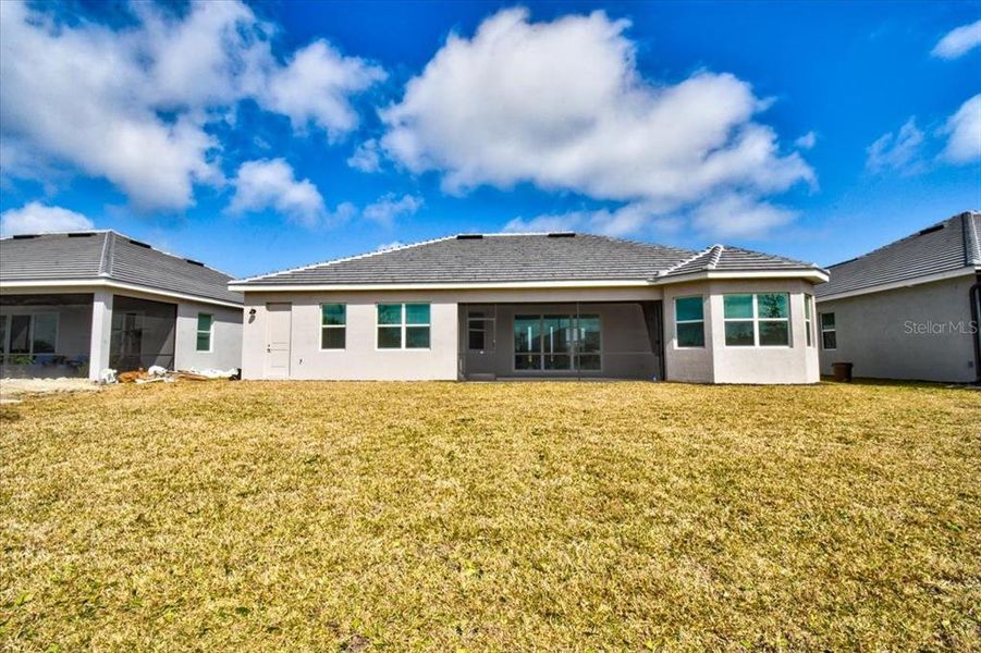 Exterior details and patio area of a home in Harbor East, Port Charlotte (Image 19).