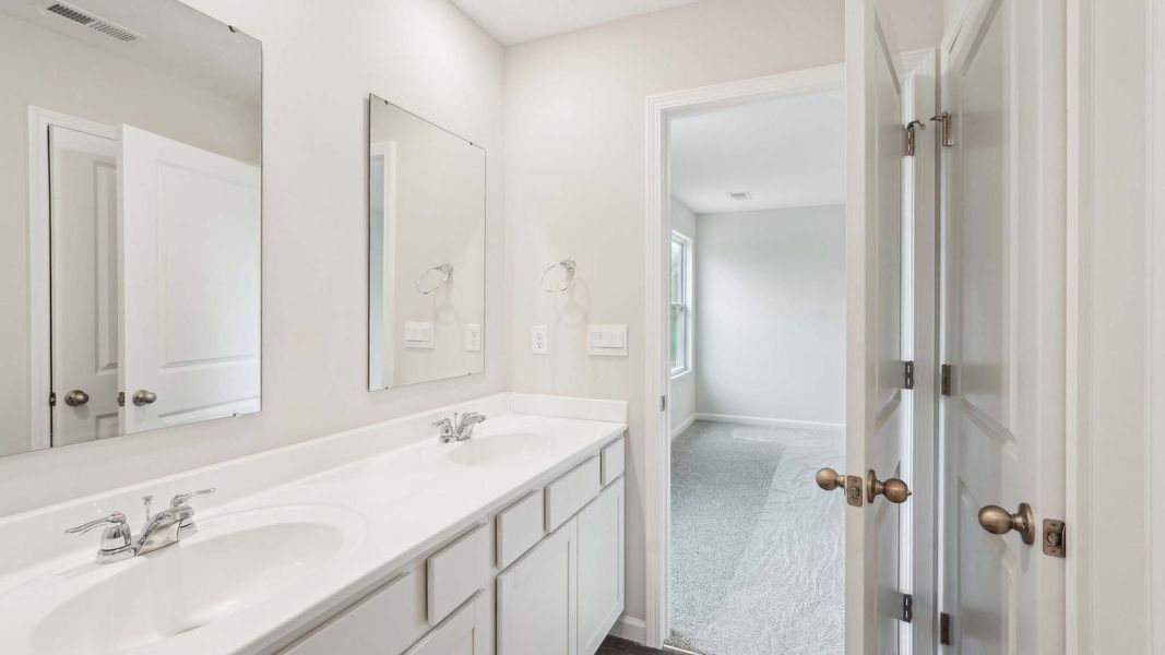 Furnished interior view inside a new home in The Pines at Blake Farm, Wilmington (Image 7). Furnished interior view inside a new home in The Pines at Blake Farm, Wilmington (Image 7).