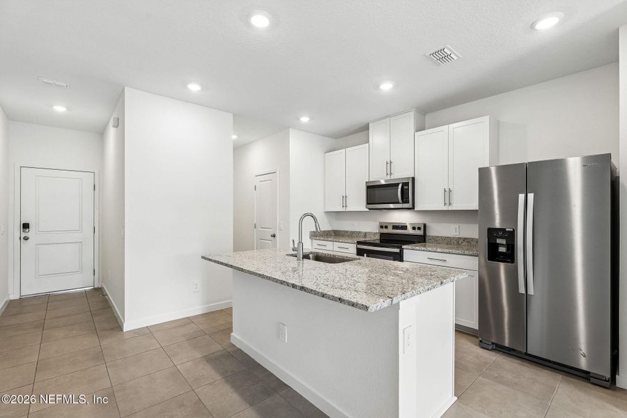 Furnished interior view inside a new home in The District at Oakleaf - The Commons, Middleburg (Image 4).