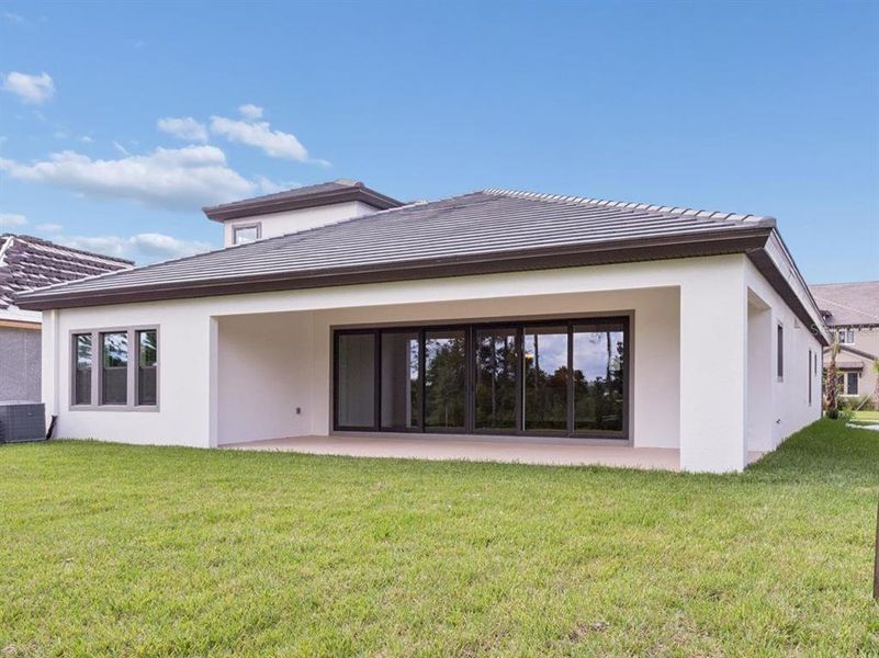 Exterior details and patio area of a home in Two Rivers, Zephyrhills (Image 3).
