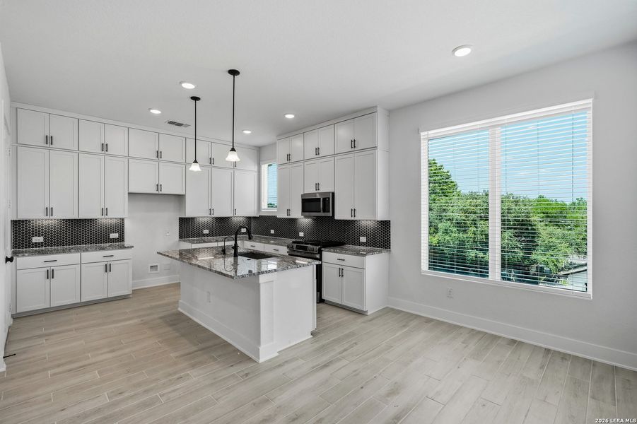 Furnished interior view inside a new home in Rose Hill, San Antonio (Image 16).