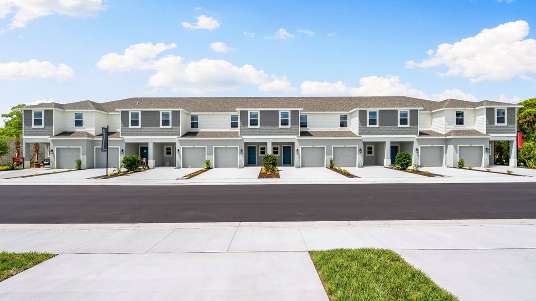 Representative exterior photo of a completed home built from the Jasmine by Taylor Morrison in The Towns at Tiburon, Nokomis, FL (Image 18).