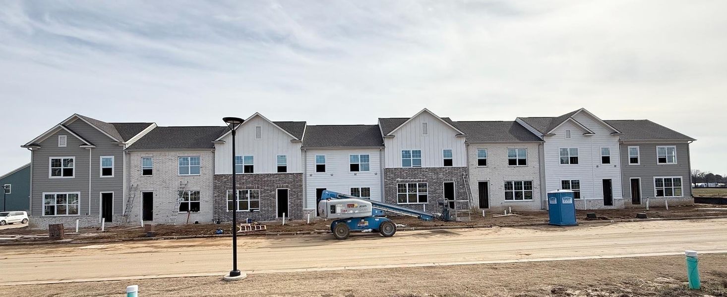 View of front of house featuring board and batten siding and a residential view