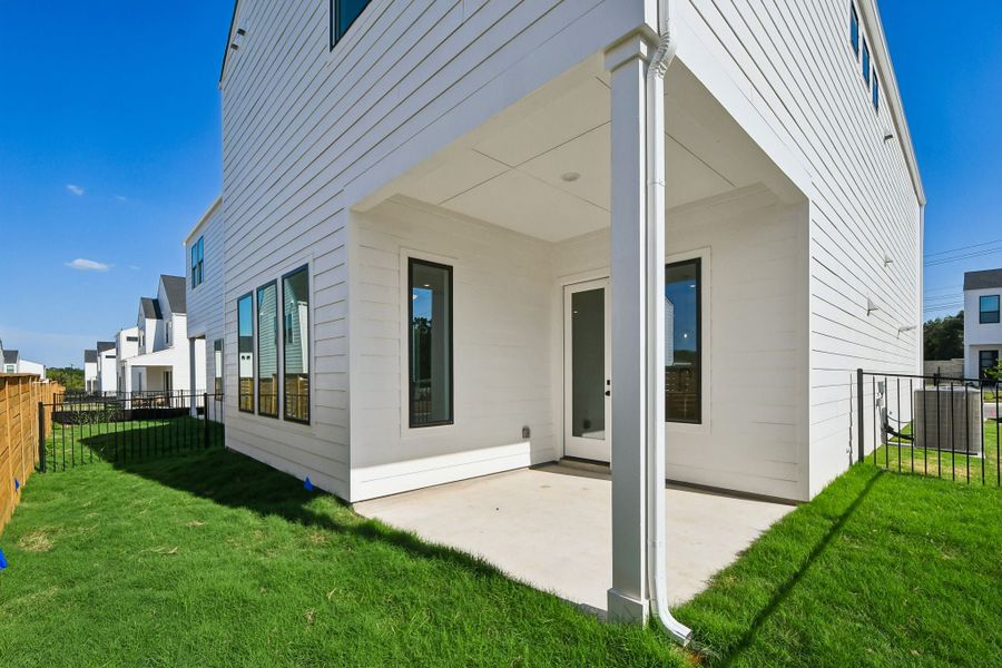 Exterior details and patio area of a home in Novel, Austin (Image 2). Exterior details and patio area of a home in Novel, Austin (Image 2).