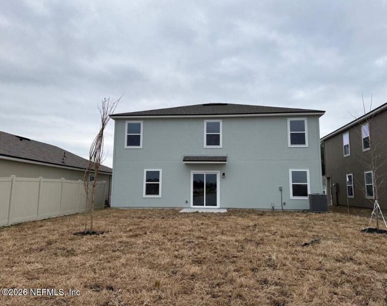 Exterior details and patio area of a home in The Arbors, Jacksonville (Image 4). Exterior details and patio area of a home in The Arbors, Jacksonville (Image 4).