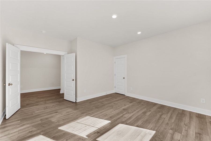 An empty room offers potential with warm luxury wo