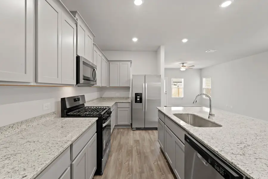 Furnished interior view inside a new home in Lonestar Collection at Paloma at Sanford Farms, Waller (Image 7).