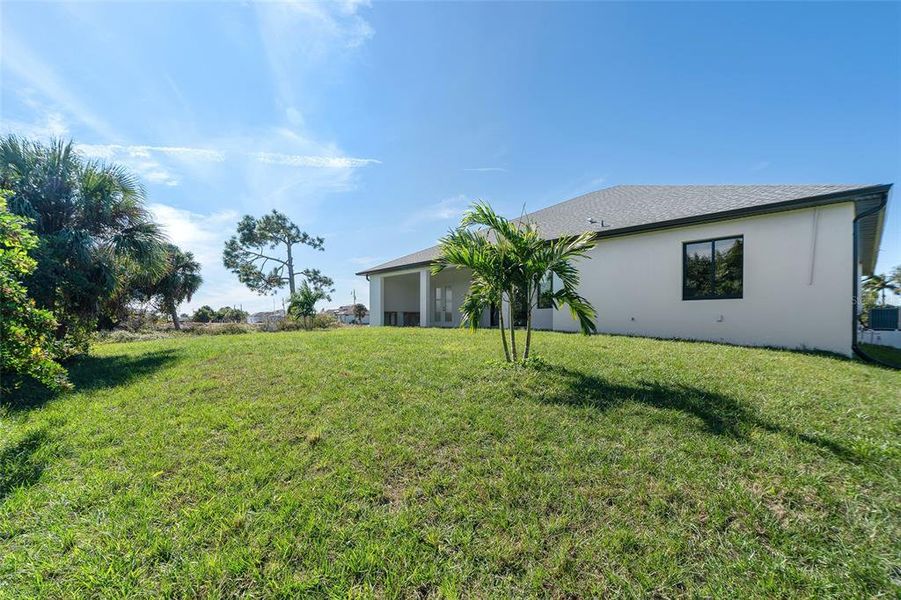 Exterior details and patio area of a home in , Rotonda West (Image 28).