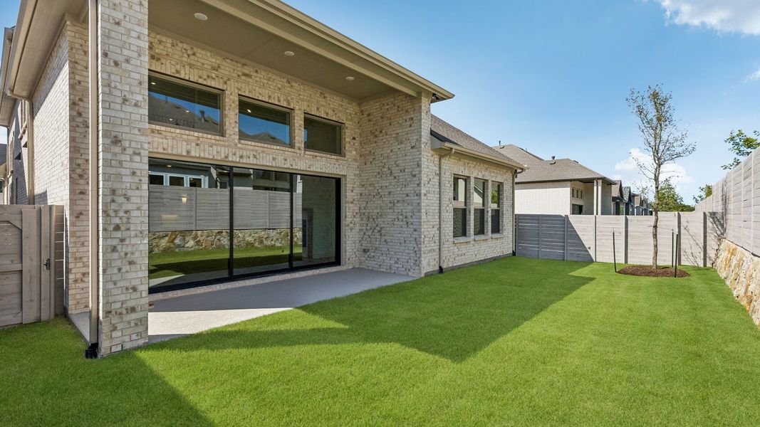 Exterior details and patio area of a home in Painted Tree 50' Series, McKinney (Image 2). Exterior details and patio area of a home in Painted Tree 50' Series, McKinney (Image 2).