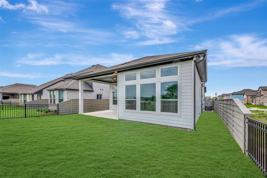 Exterior details and patio area of a home in Pomona - Reserve Collection, Manvel (Image 4).