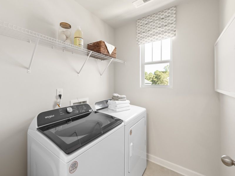 The convenient laundry room makes household chores a breeze.