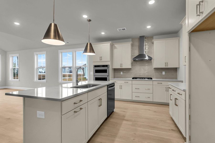 Furnished interior view inside a new home in Tidewater at Lakes of Cane Bay, Summerville (Image 7).