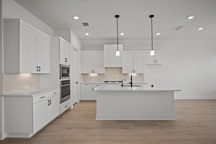 Furnished interior view inside a new home in Village at Three Oaks, Seguin (Image 8).