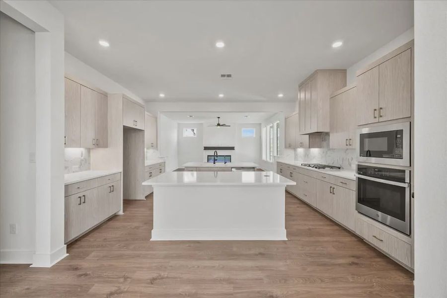 Representative furnished interior of a home built from the Courtney by Chesmar Homes in 6 Creeks, Kyle (Image 4).