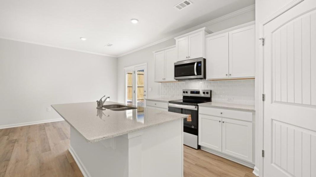 Furnished interior view inside a new home in Falcon Landing, Gainesville (Image 5).