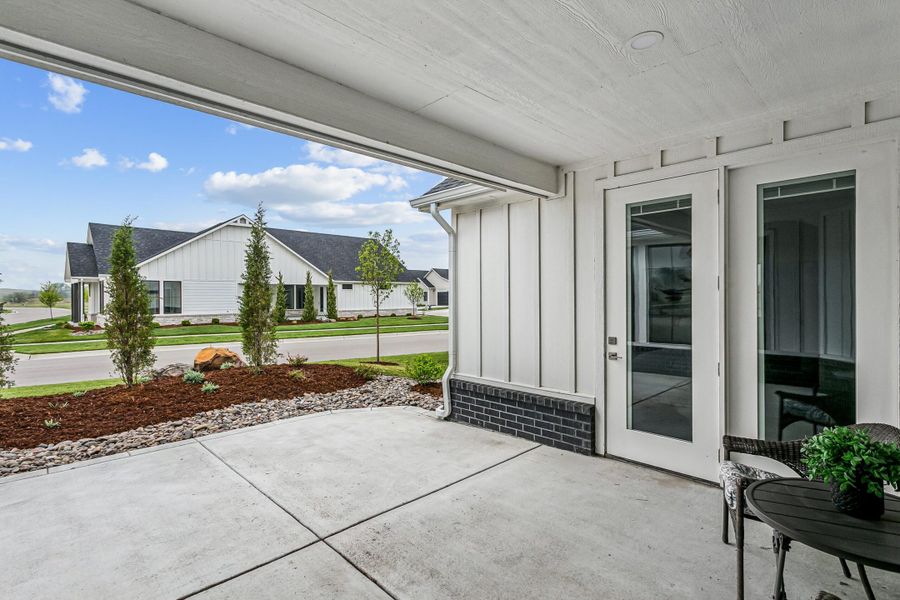 Exterior details and patio area of a home in The Courtyards at The Moorings, Wichita (Image 4).