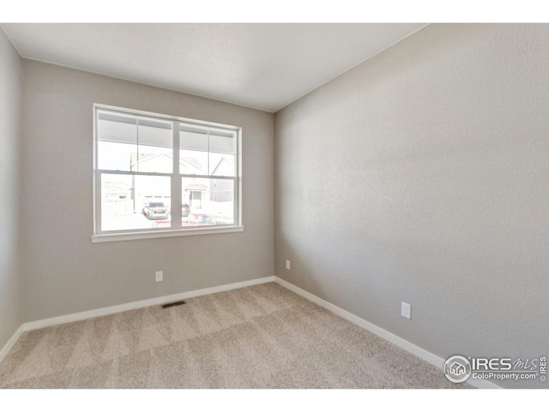 Spacious, unfurnished interior of a new home in Silver Peaks, Lochbuie (Image 15).