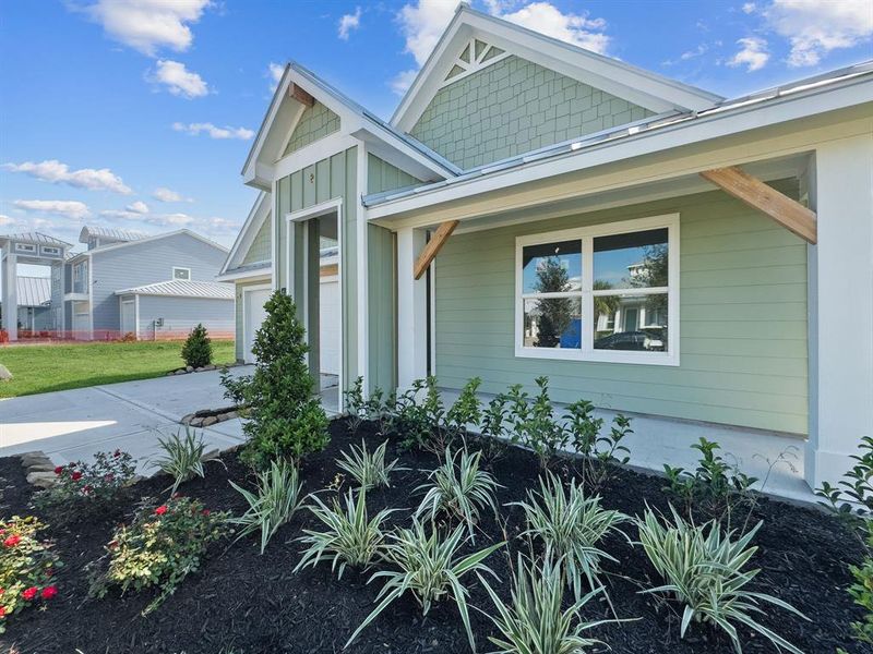 Front exterior of a new home in Grand Cay Harbour, Texas City, TX, highlighting curb appeal (Image 17). Front exterior of a new home in Grand Cay Harbour, Texas City, TX, highlighting curb appeal (Image 17).