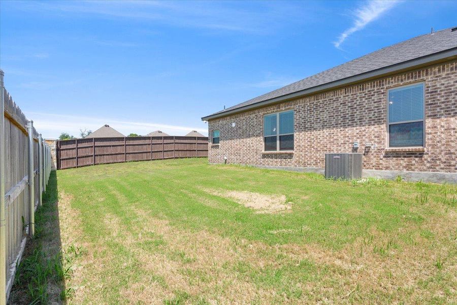 Exterior details and patio area of a home in , Belton (Image 25).