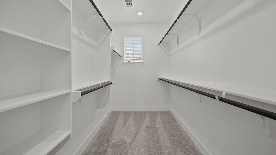 Representative unfurnished interior of a home built from the Rosewood by Chesmar Homes in Sienna Courtyard, Missouri City (Image 13).