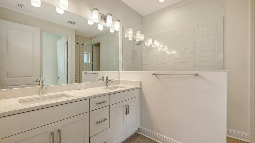 Furnished interior view inside a new home in Palm Grove Real Estate and Homes for Sale in Lakewood Ranch, FL - Neal Communities, Lakewood Ranch (Image 15).