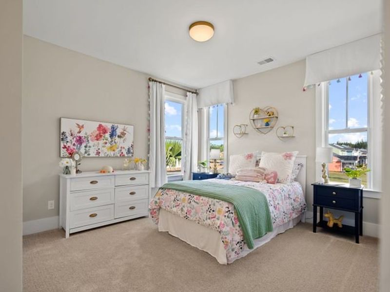 Representative furnished interior of a home built from the Jasper P by True Homes in Homecoming, Ravenel (Image 13).