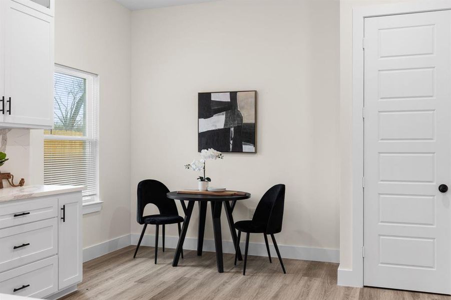 Dining area featuring light hardwood / wood-style flooring