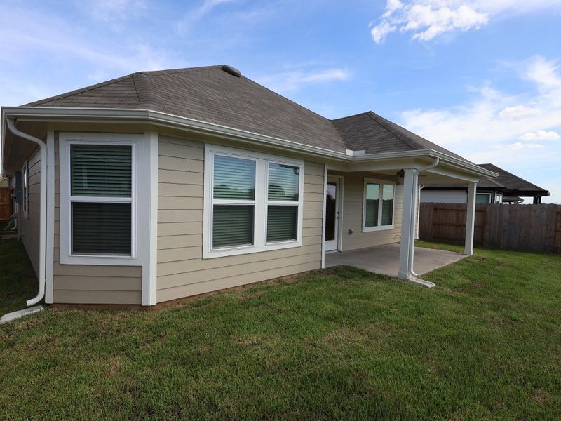 Front exterior of a new home in Summerview, Fulshear, TX, highlighting curb appeal (Image 10). Front exterior of a new home in Summerview, Fulshear, TX, highlighting curb appeal (Image 10).