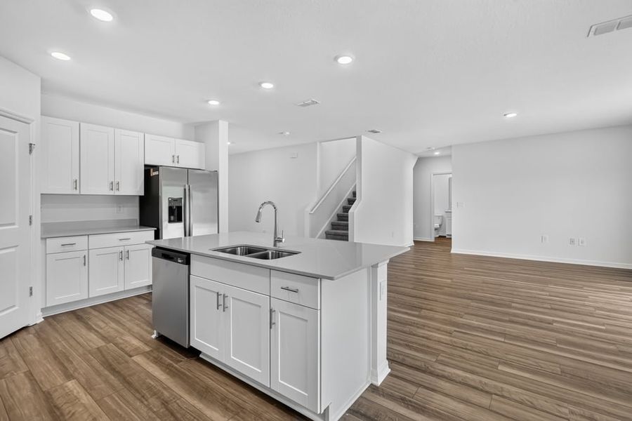 Representative furnished interior of a home built from the Kingfisher by Taylor Morrison in Palm Wind, Hudson (Image 6).