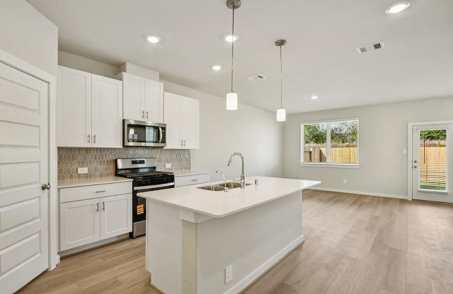 Photo is not of the actual home, but is an inspirational photo of builder’s model home and may depict options, furnishings, and/or decorator features that are not included