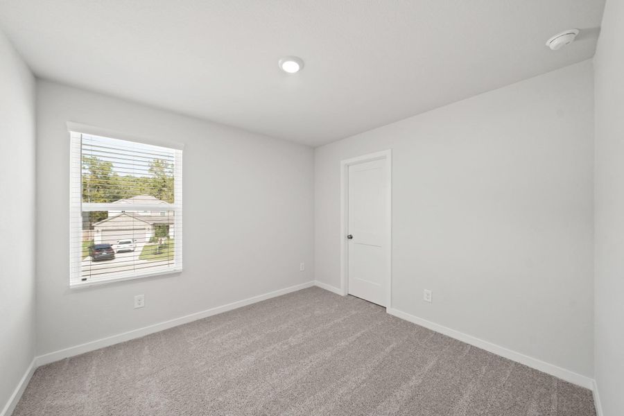 Spacious, unfurnished interior of a new home in Lakes at Black Oak, Magnolia (Image 21).