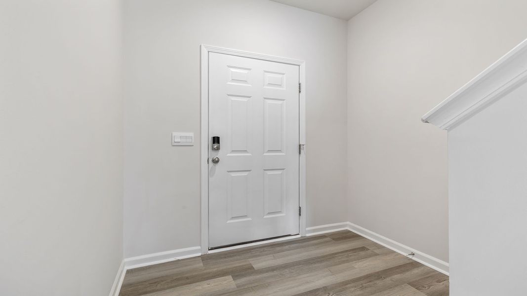 Spacious, unfurnished interior of a new home in Tanglewood Townes, Greenville (Image 12).