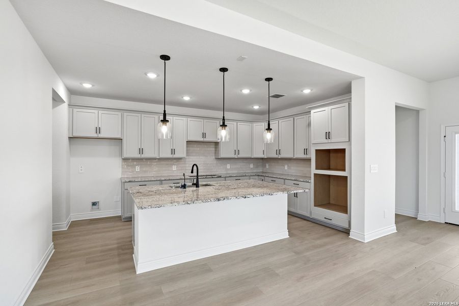 Furnished interior view inside a new home in Bison Ridge, San Antonio (Image 18).