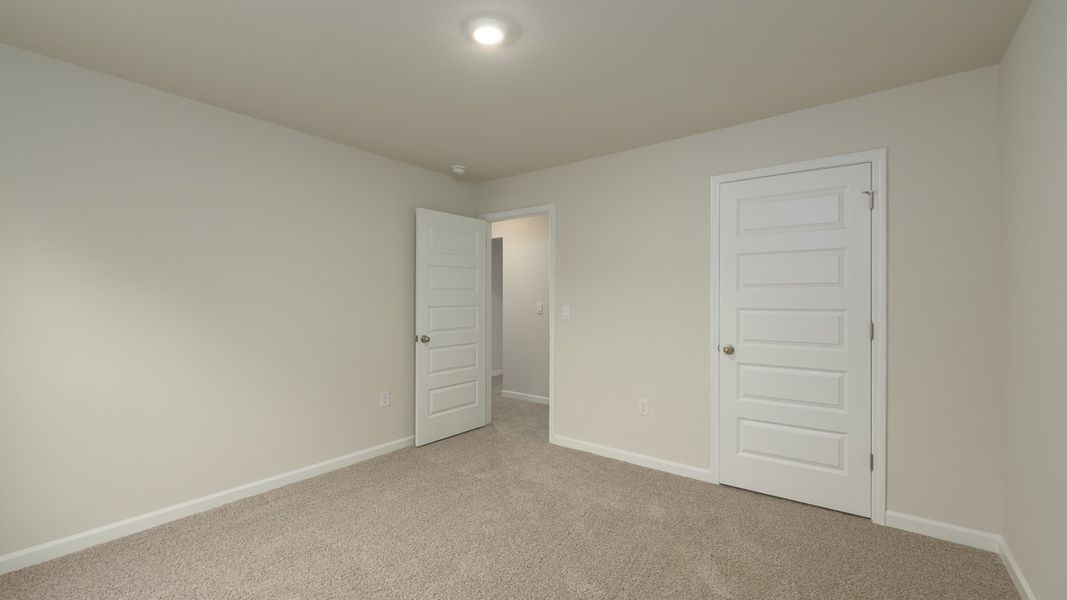 Spacious, unfurnished interior of a new home in Brooks Station, Dacula (Image 27).