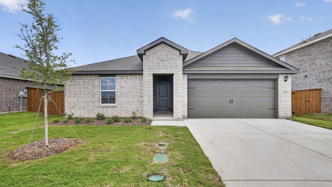 Front exterior of a new home in Forestbrook Estates, Paris, TX, highlighting curb appeal (Image 1). Front exterior of a new home in Forestbrook Estates, Paris, TX, highlighting curb appeal (Image 1).
