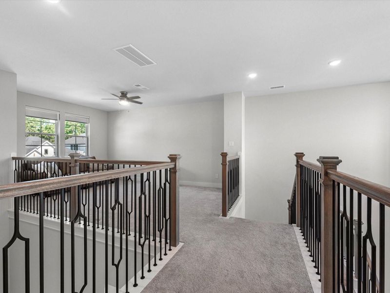 Upstairs landing with secondary living/game room Upstairs landing with secondary living/game room