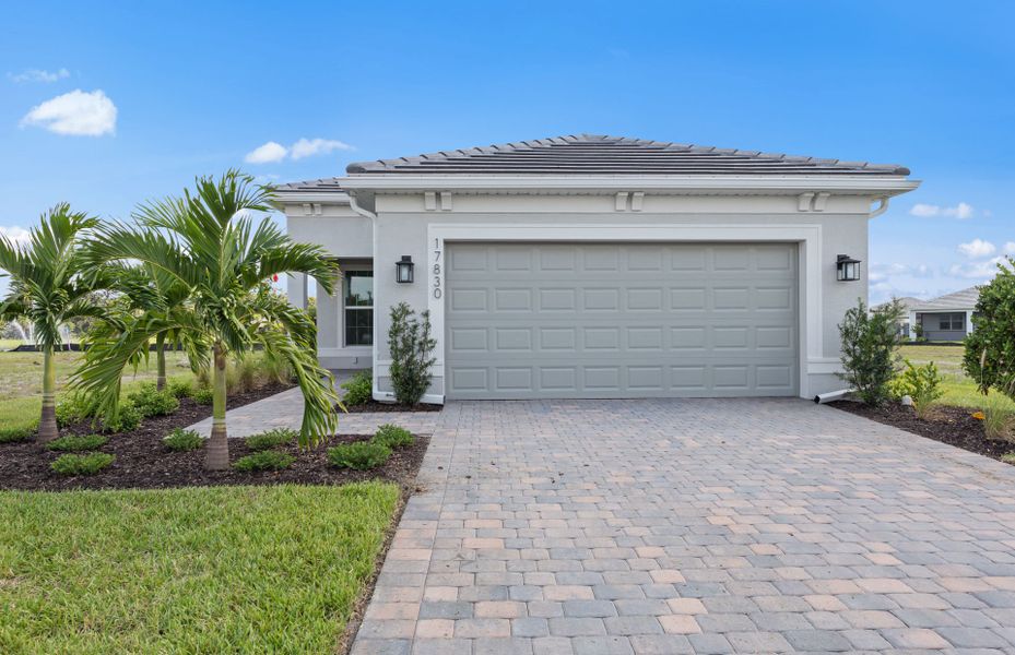 Exterior details and patio area of a home in Del Webb Oak Creek, North Fort Myers (Image 4).