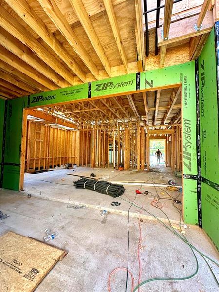 Current construction 10/2/24. View from the outdoor patio to the Family room.  Ther e will be a wall of glass sliding doors.