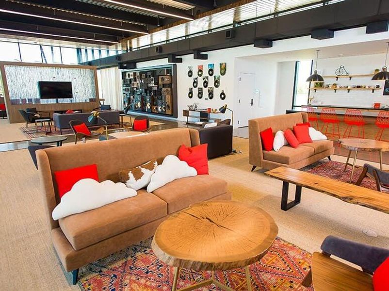 Community lobby featuring a high ceiling Community lobby featuring a high ceiling