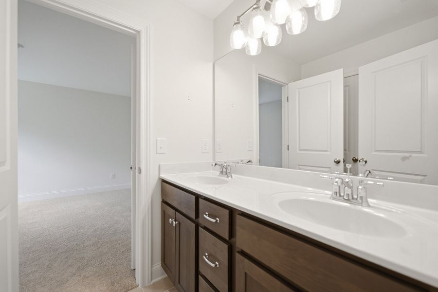 Furnished interior view inside a new home in Aden Woods, Fairview (Image 13).
