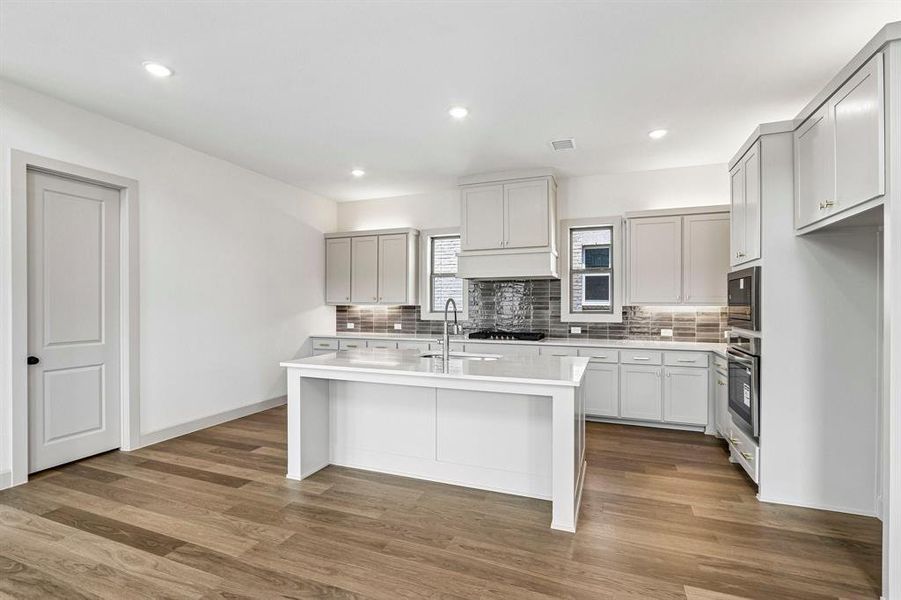 Featuring storage and prep space galore, the chef in the family will love creating culinary masterpieces in this dream kitchen!