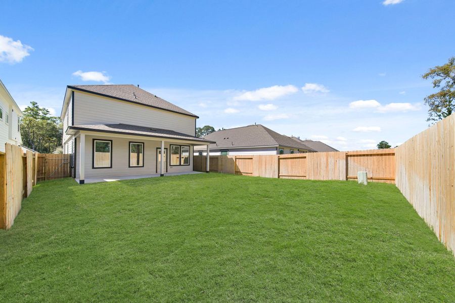 Exterior details and patio area of a home in Cypresswood Landing, Humble (Image 15). Exterior details and patio area of a home in Cypresswood Landing, Humble (Image 15).