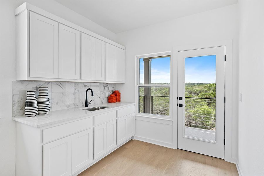 Wet bar area opening to upstairs deck