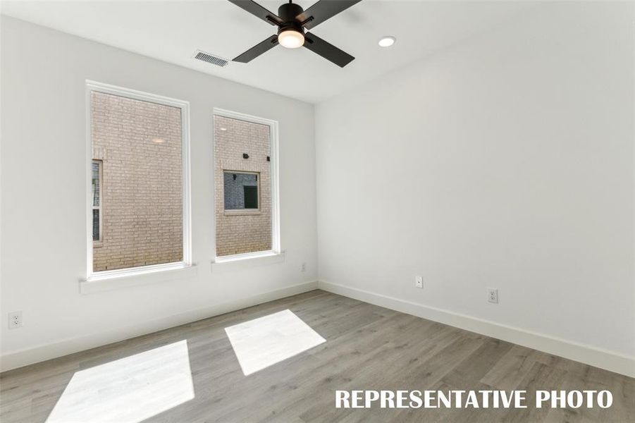 This light filled home office is the perfect place for work or play!  REPRESENTATIVE PHOTO